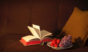 strawberries and grapes on white plate