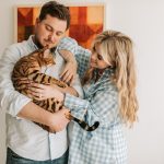 Couple Holding a Pet Cat